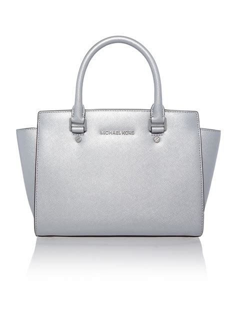 michael kors silver satchel handbag.